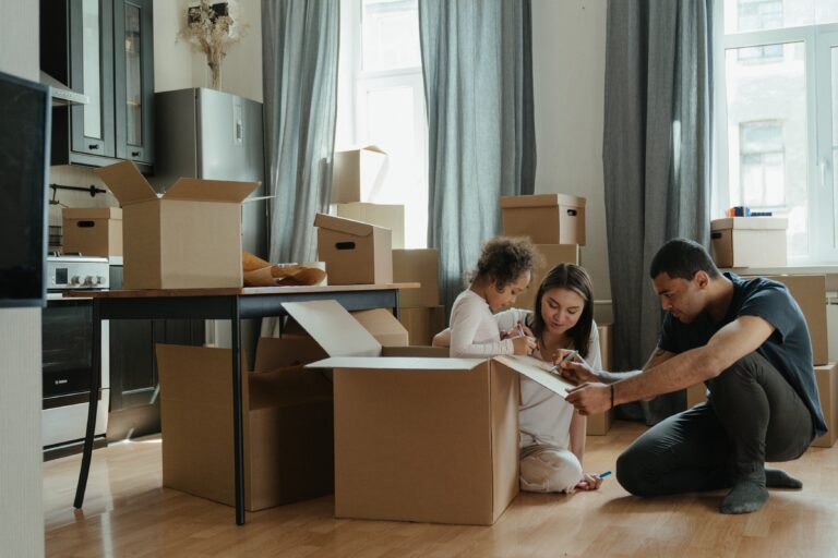 Photo of a family unpacking after a move