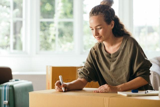 woman preparing stuff for moving